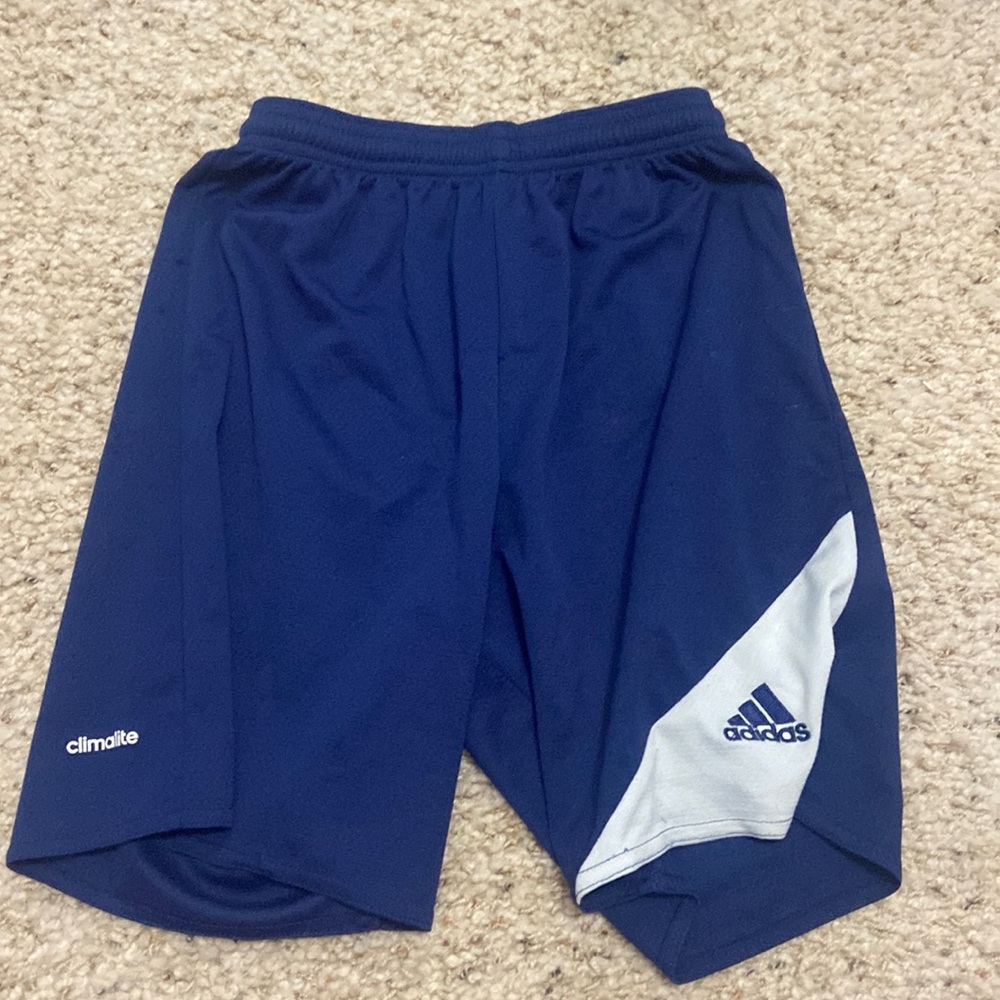 Navy blue and white adidas youth size medium basketball shorts
